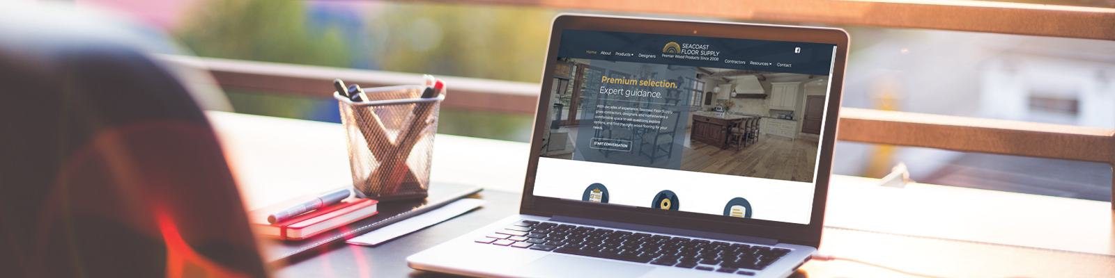 laptop with Seacoast Floor Supply website on the screen